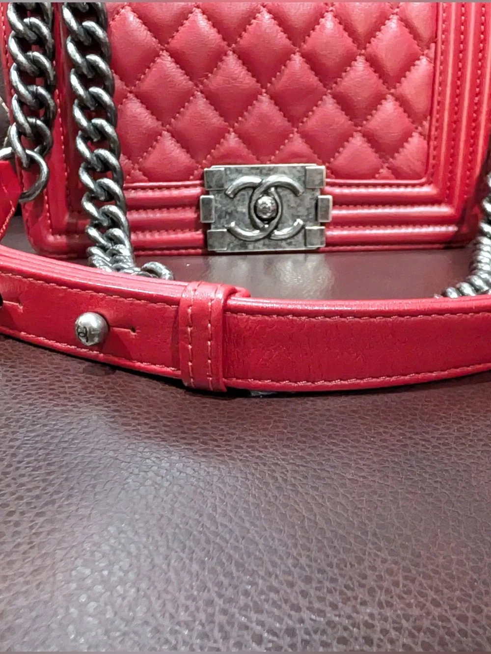 CHANEL Red leather small Boy with gunmetal tone chain